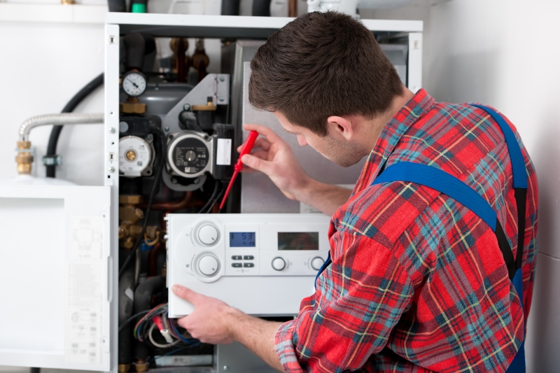 Gas Safe engineer working on a boiler in Bloomsbury